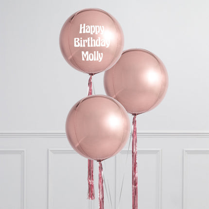 Trio of helium-filled orb balloons