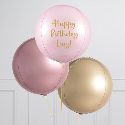 Trio of helium-filled orb balloons